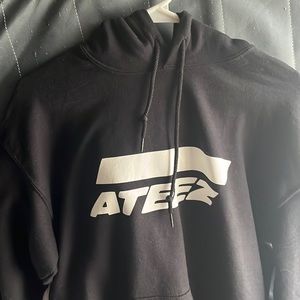 Black and white Kpop Ateez hoodie with members names on the back. Size Medium.